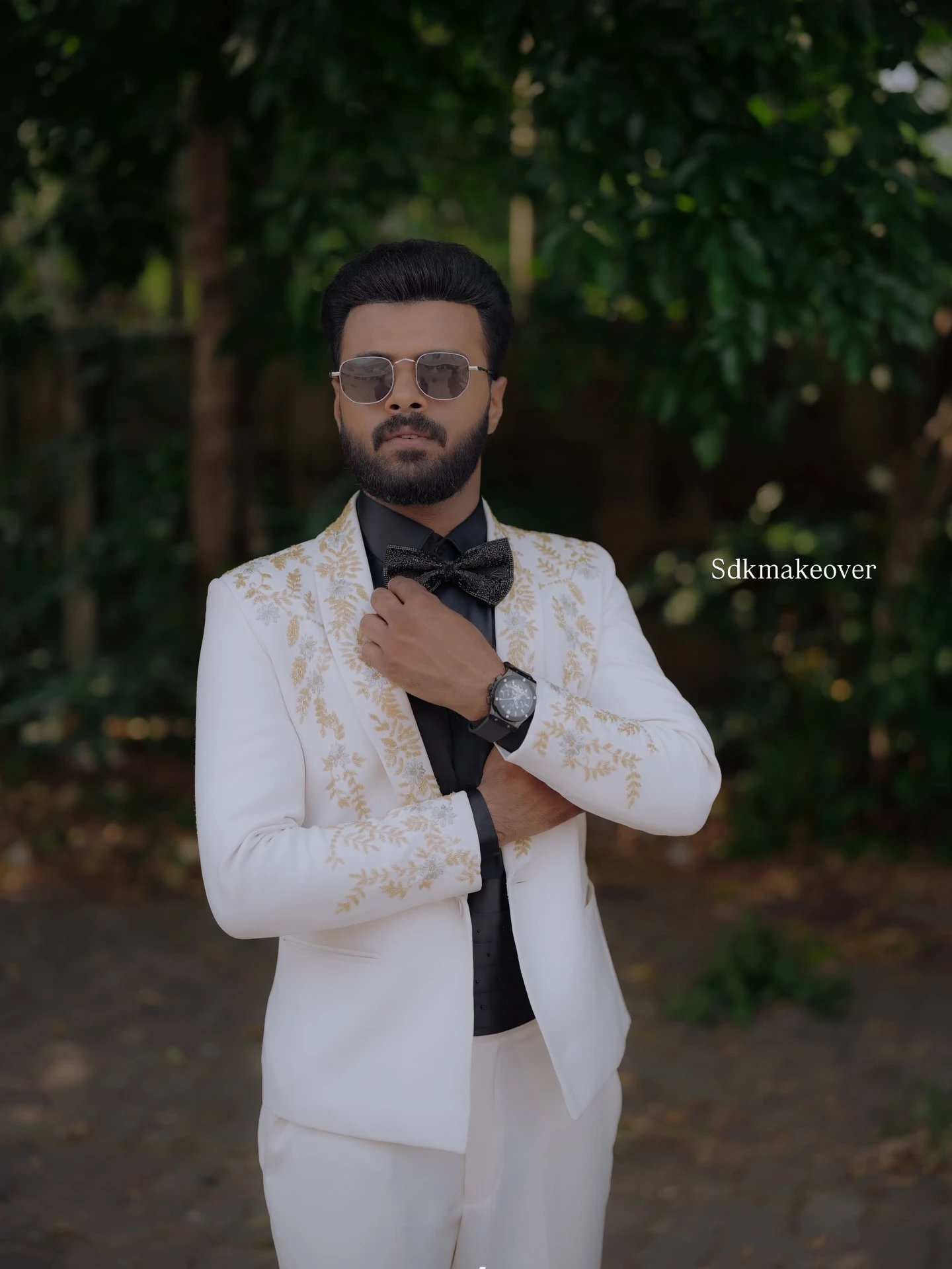 Groom in navy tuxedo